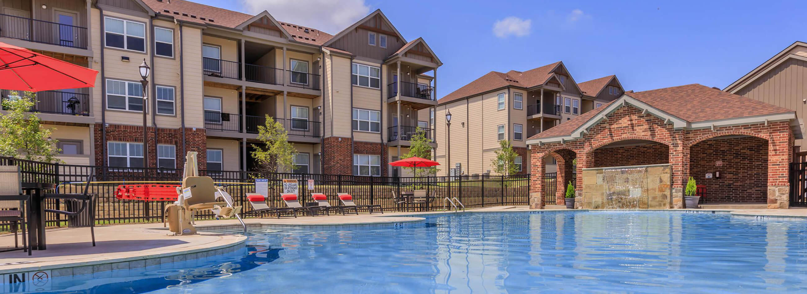 pool area with a waterfall feature